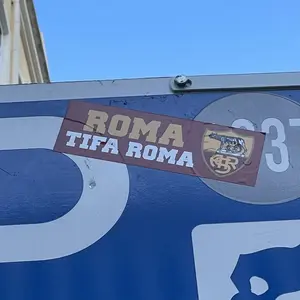 AS Roma football sticker #883 found in this city